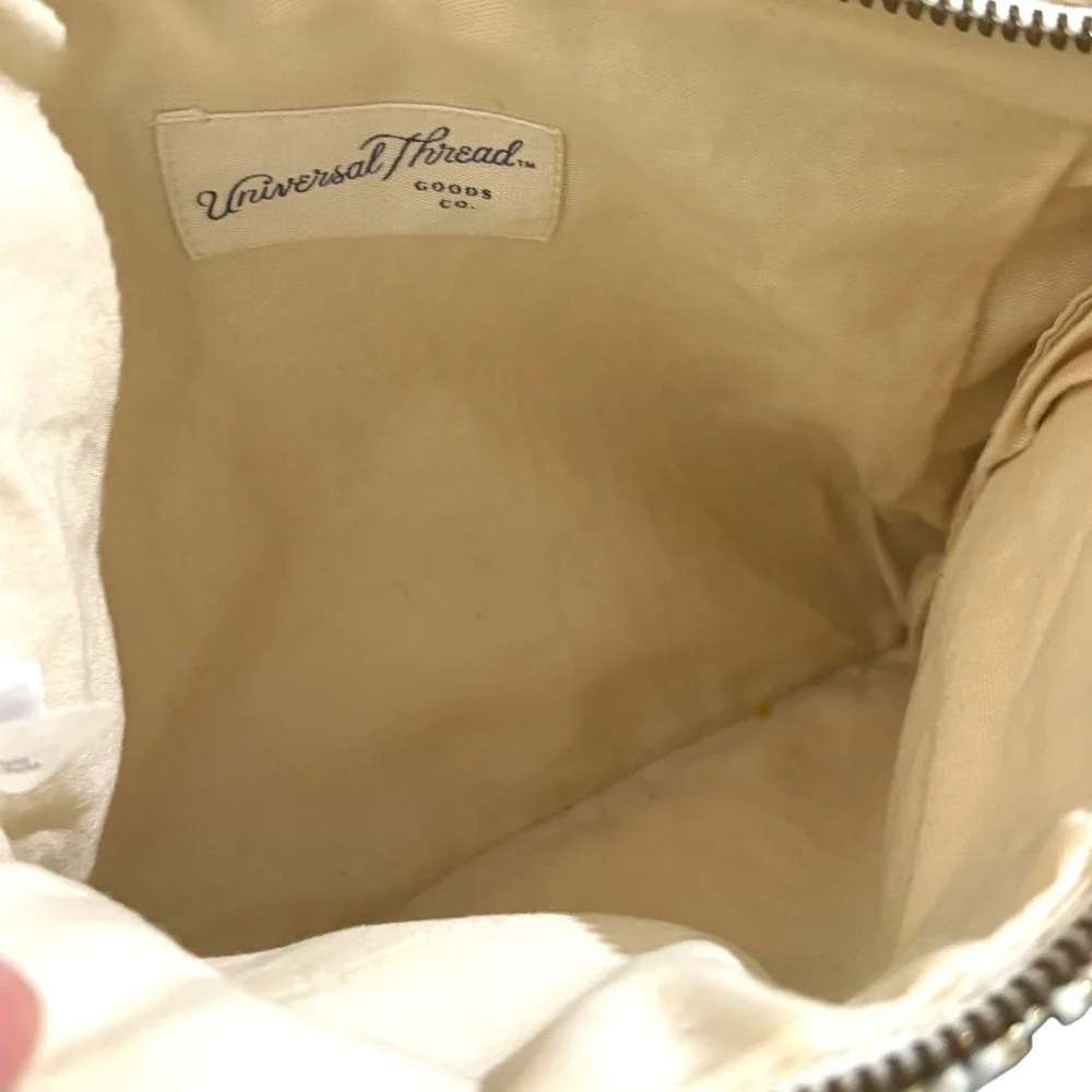Universal Thread woven clutch